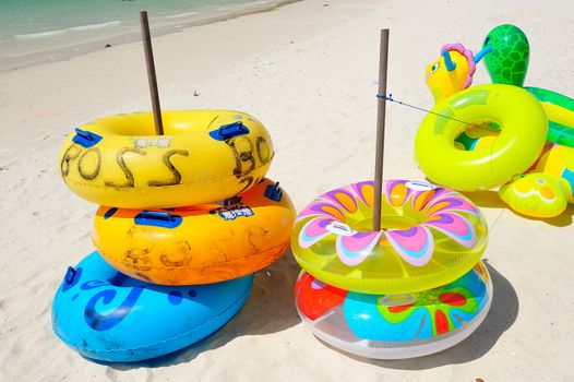 colorful life buoy on the beach at koh lan pattaya, thailand