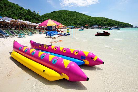 colorful banana boat on the beach at koh lan pattaya, thailand