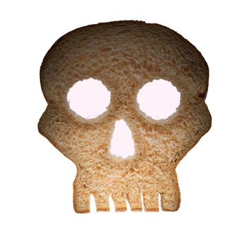 Skull shaped piece of bread cut from whole wheat loaf to illustrate danger from gluten in wheat products