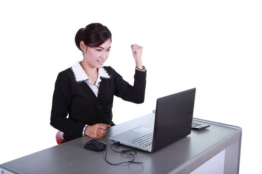 Celebrating businesswoman with laptop computer isolated on white background