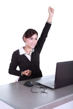 Celebrating businesswoman with laptop computer isolated on white background