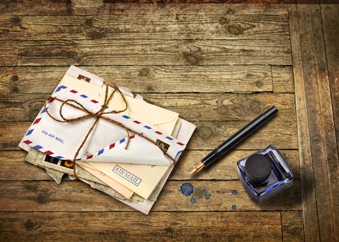 Nostalgic airmail letters with ink bottle and fountain pen