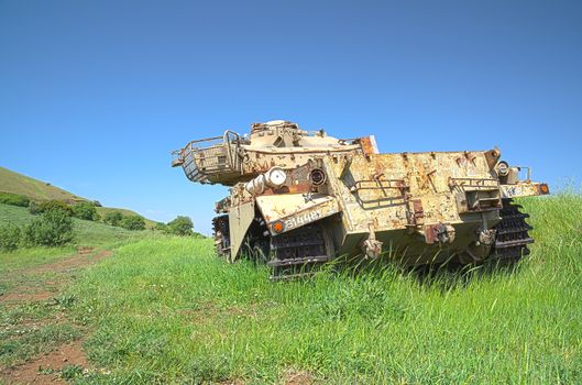 Destroyed rusty Centurion Shot Kal tank on Golan Heights. HDR photo.