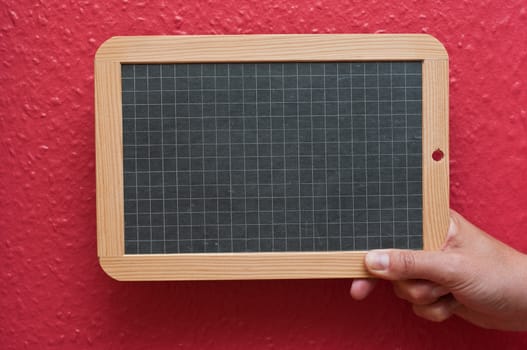 man holding a Chalkboard in hand