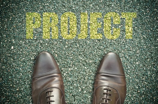 concept message on the road with feet - project