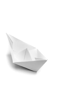 white origami handmade paper ship on white