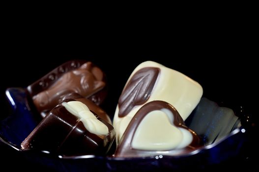 Chocolate on a blue dish