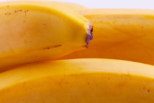 Yellow bananas in a strict close up