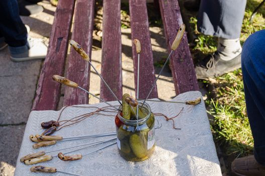 handmade metal spit to pull out of jar pickled vegetables