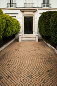 building entry- ancient luxury door  and cobbles