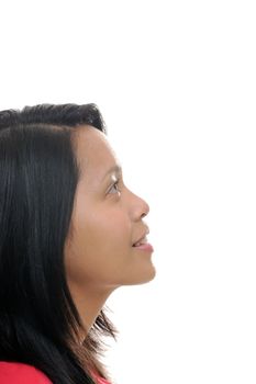 Asian girl looking up into white space