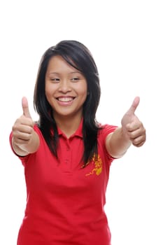 Cheerful asian girl in red with thumbs up