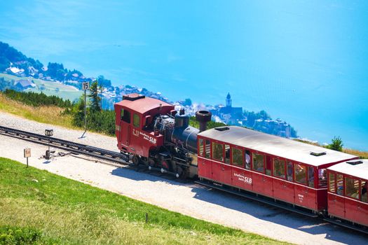 ST. WOLFGANG, AUSTRIA - AUGUST 6: Steam train railway going to Schafberg Peak (1783m) on August 6, 2013 in St. Wolfgang.