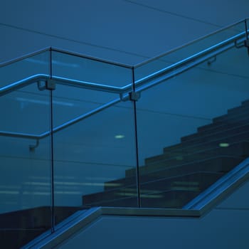 Modern staircase with glass railling 