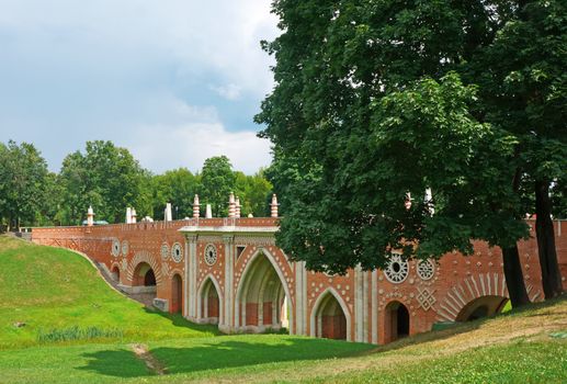 Bridge of red brick decorated with white pattern
