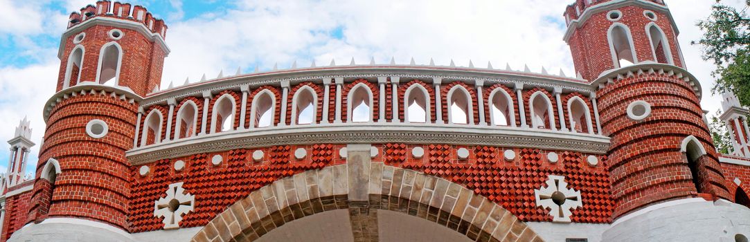 Bridge of red brick decorated with white pattern