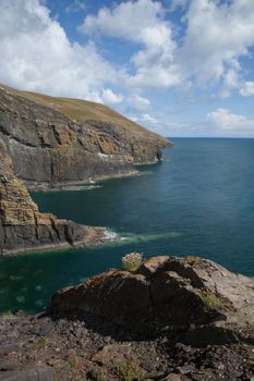 Scenic viewpoint of the shale sea cliffs, a popular rock climbing venue, of Cilan Head, Lleyn peninsular, Gwynedd, Wales, UK.