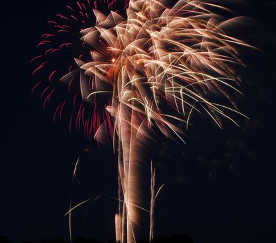 fireworks lighting the night sky in different colors