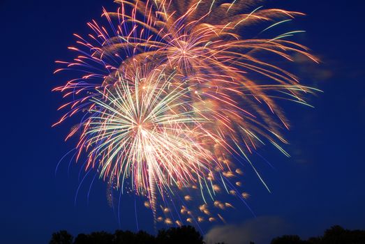 fireworks lighting the night sky in different colors