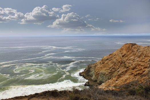 Beautiful views of the rocky cliffs and coastline near Half Moon Bay, California