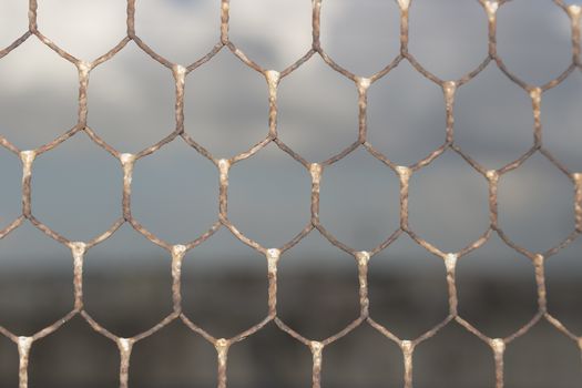 Rusty old wire netting on the roof of Doxi Stracca Fontana Palace about 1760 A.D. in the old town of Gallipoli (Le)) in the southern Italy