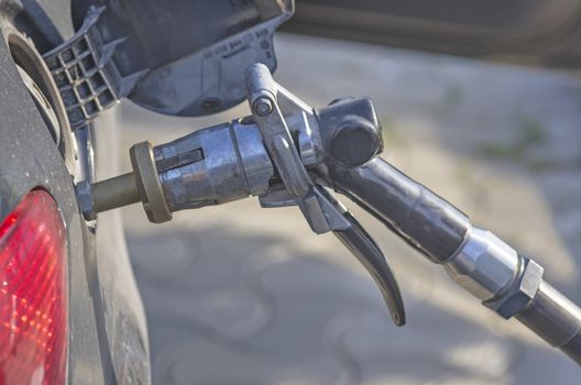 LPG car refueling in a gas station