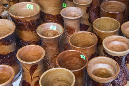 Romanian traditional handcrafted mugs in a souvenir shop