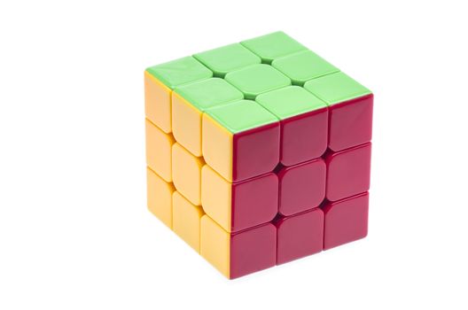 Close up image of a Rubik's cube on white