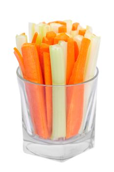 Slices of fresh green celeryand carrot in glass isolated on white