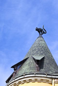 The cat sculpture on the roof of Cat House in Riga, Latvia.