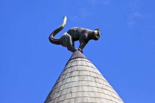 The cat sculpture on the roof of Cat House in Riga, Latvia.