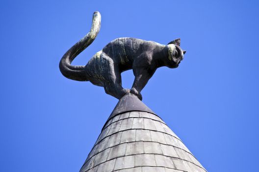 The cat sculpture on the roof of Cat House in Riga, Latvia.