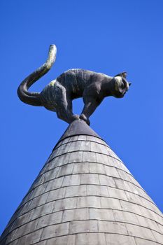 The cat sculpture on the roof of Cat House in Riga, Latvia.