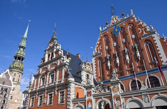 The historic House of the Blackheads and St. Peter's Church in the old town of Riga in Latvia.