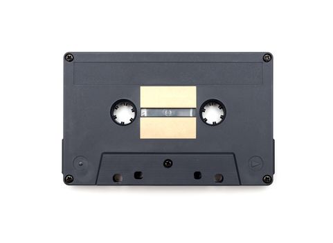 close up of vintage audio tape on white background