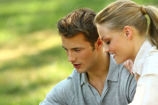 Closeup portrait of smiling young couple in love - Outdoors 