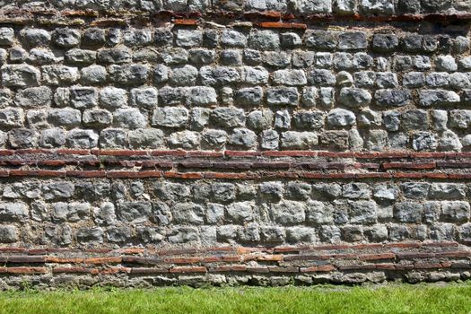 A close up detail of London Wall which was a defensive structure first built by the Romans around the centre of London.