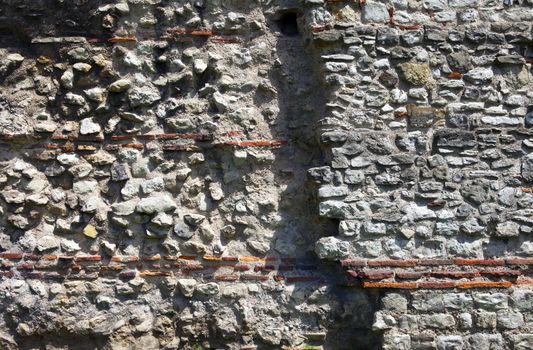 Close up detail of London Wall which was a defensive structure first built by the Romans around the centre of London.
