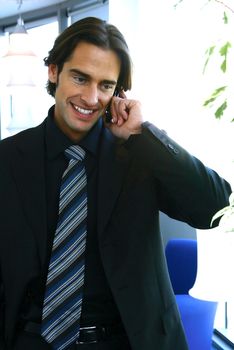 handsome young businessman at the office 