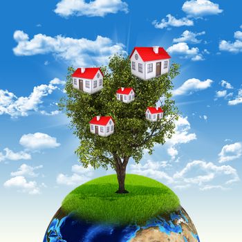 Earth and tree with houses. Elements of this image are furnished by NASA