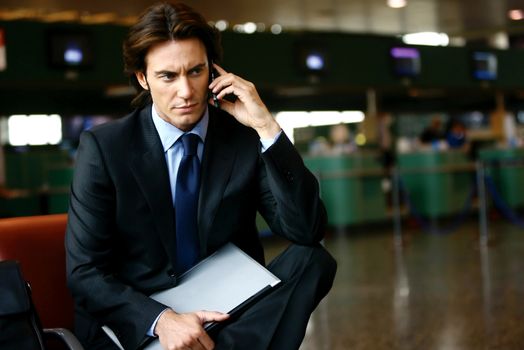 businessman who has sitting in the airport 