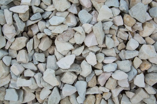 Grey sharp stones used for construction. Background