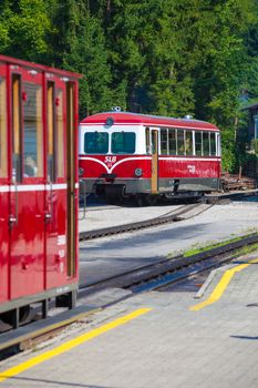 ST. WOLFGANG, AUSTRIA - AUGUST 6: Diesel locomotive of a vintage cogwheel railway going to Schafberg Peak (1783m) on August 6, 2013 in St. Wolfgang.