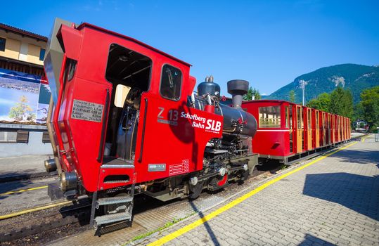 ST. WOLFGANG, AUSTRIA - AUGUST 6: Steam locomotive of a vintage cogwheel railway going to Schafberg Peak (1783m) on August 6, 2013 in St. Wolfgang.