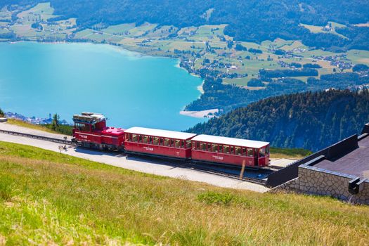 ST. WOLFGANG, AUSTRIA - AUGUST 6: Diesel train railway going to Schafberg Peak (1783m) on August 6, 2013 in St. Wolfgang.