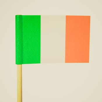 Vintage retro looking The national Irish flag of Ireland (IE) - isolated over white background