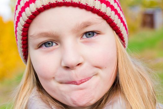 Photo of beautiful girl in red hat