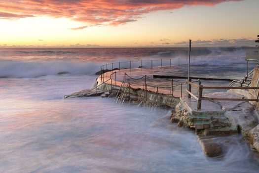Large swell and surf crashing over the railings, no swimming at Bronte Beach baths today