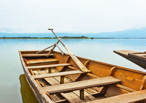 Antique wooden boat ferries transport people up to 6 people