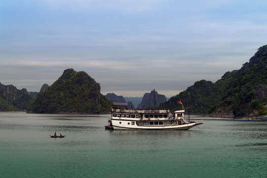 Fishing Boat and Ship in Ha Long Bay, Vietnam. 